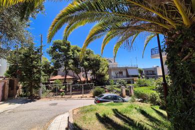 Corner plot with forest and city view